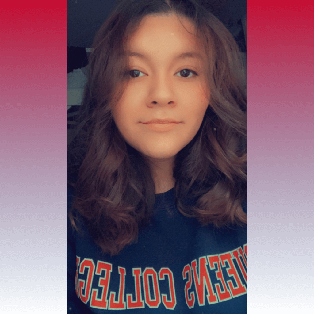 students wears a Queens College sweatshirt for CollegeBound Month celebrations