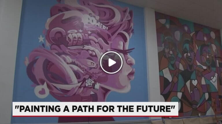 There is a picture of the mural with a headline that reads "Painting a path for the future."