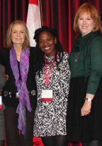 Jahleese stands between Gloria Steinem and Ann Tisch.