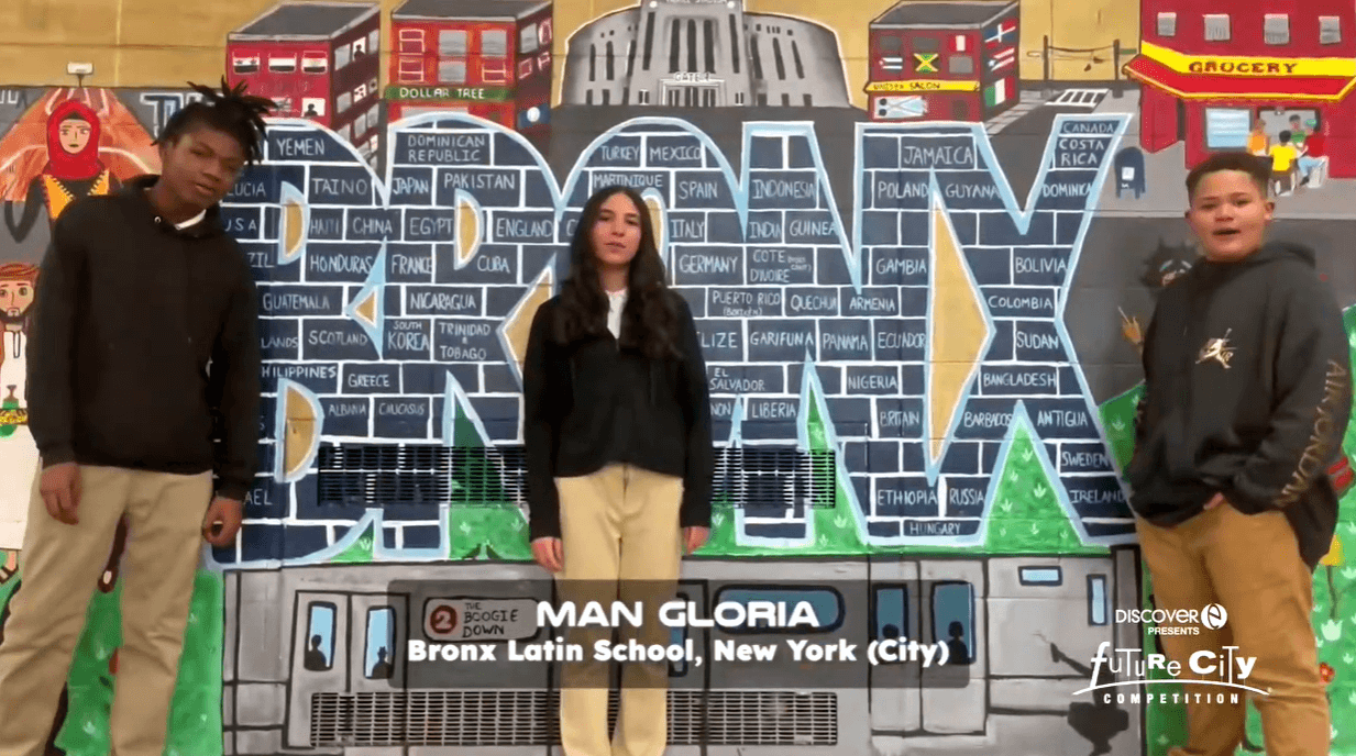 Three students stand in front of colorful mural with "Bronx" in large letters in center