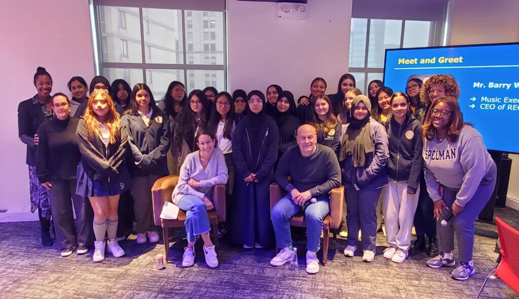 Students gather around speakers Sara Gil and Barry Weiss of RECORDS music label