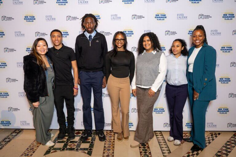Students and school leaders pose for group photo