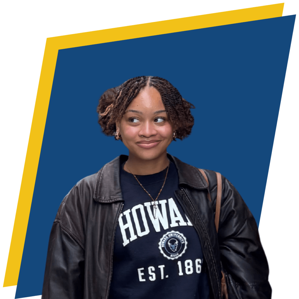 A person wearing a Howard University sweatshirt and a leather jacket stands in front of a blue background with a yellow border.