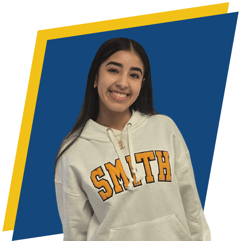 Lissa wears a white hoodie with SMITH printed in yellow, excited for going to college away from home