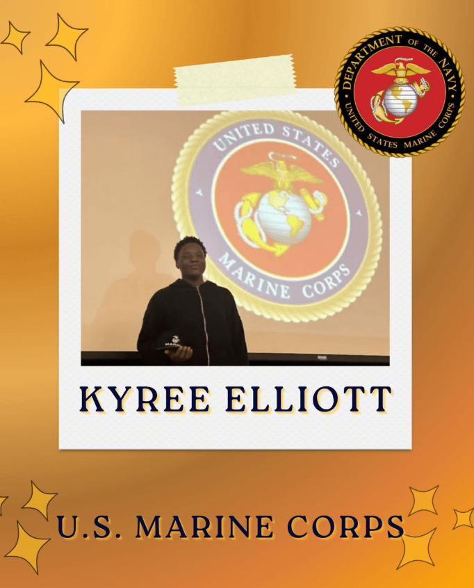 A person stands in front of a projected United States Marine Corps emblem, with the name Kyree Elliott and U.S. Marine Corps displayed below.