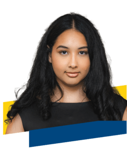 A young woman with long, curly black hair wears a black top and looks directly at the camera. The white background features yellow and blue geometric shapes at the bottom, evoking a fresh design for the Annual Report 2025.