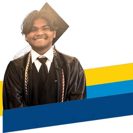 A young man in a graduation cap and gown smiles, wearing honor cords, standing in front of abstract blue and yellow color blocks—a vibrant image that captures the spirit of achievement reflected in our Annual Report 2025.