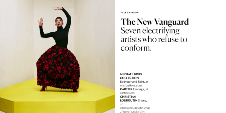 Kara Young poses for a fall fashion magazine spread in a studio, wearing a voluminous black and red floral skirt.
