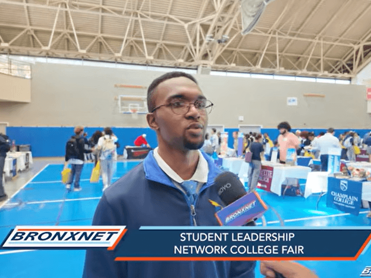 A student is being interviewed at the Bronx College Fair.